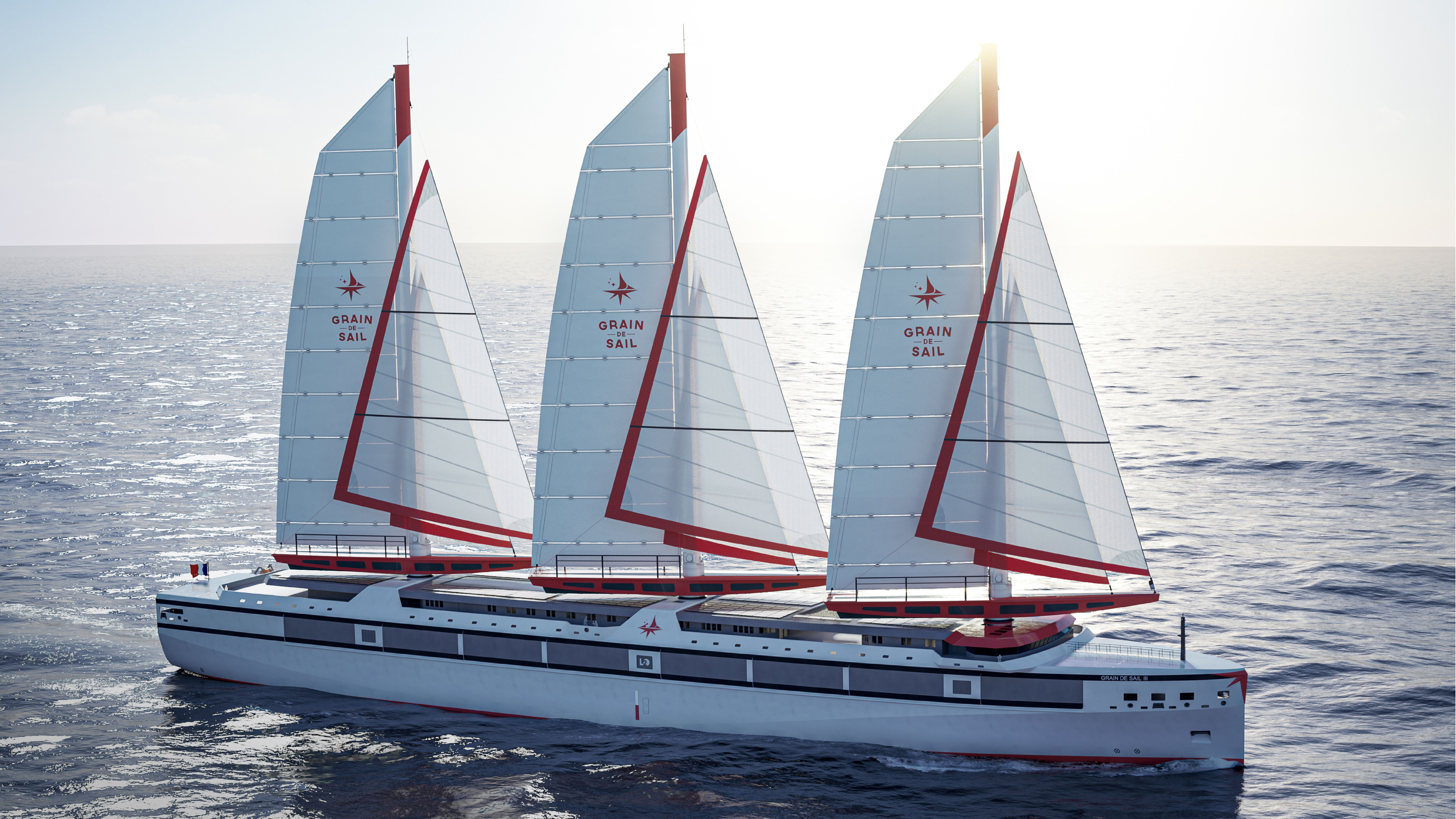 Le voilier-cargo Grain de Sail III sous voiles en pleine mer
