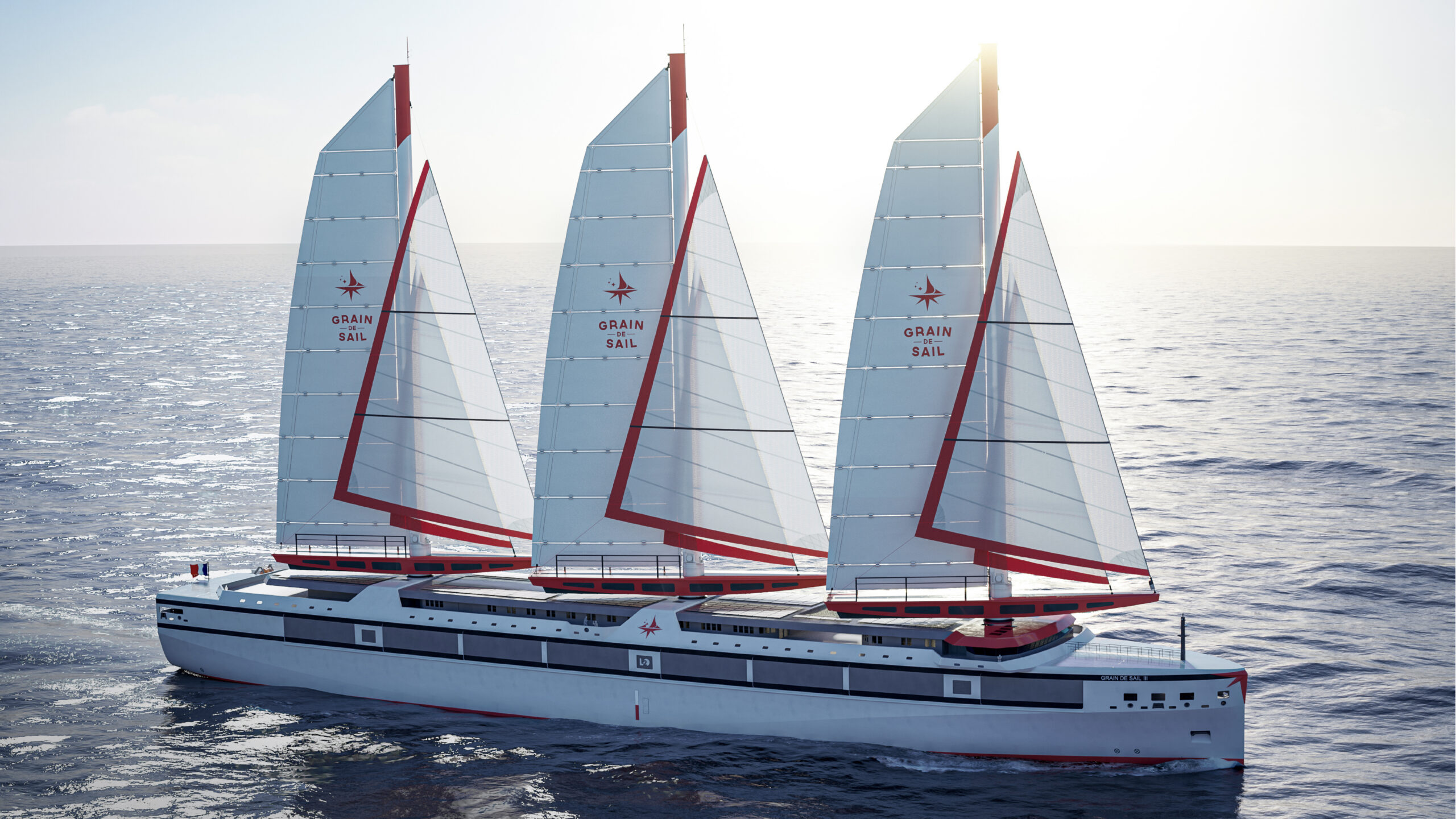 Le voilier-cargo Grain de Sail III sous voiles en pleine mer